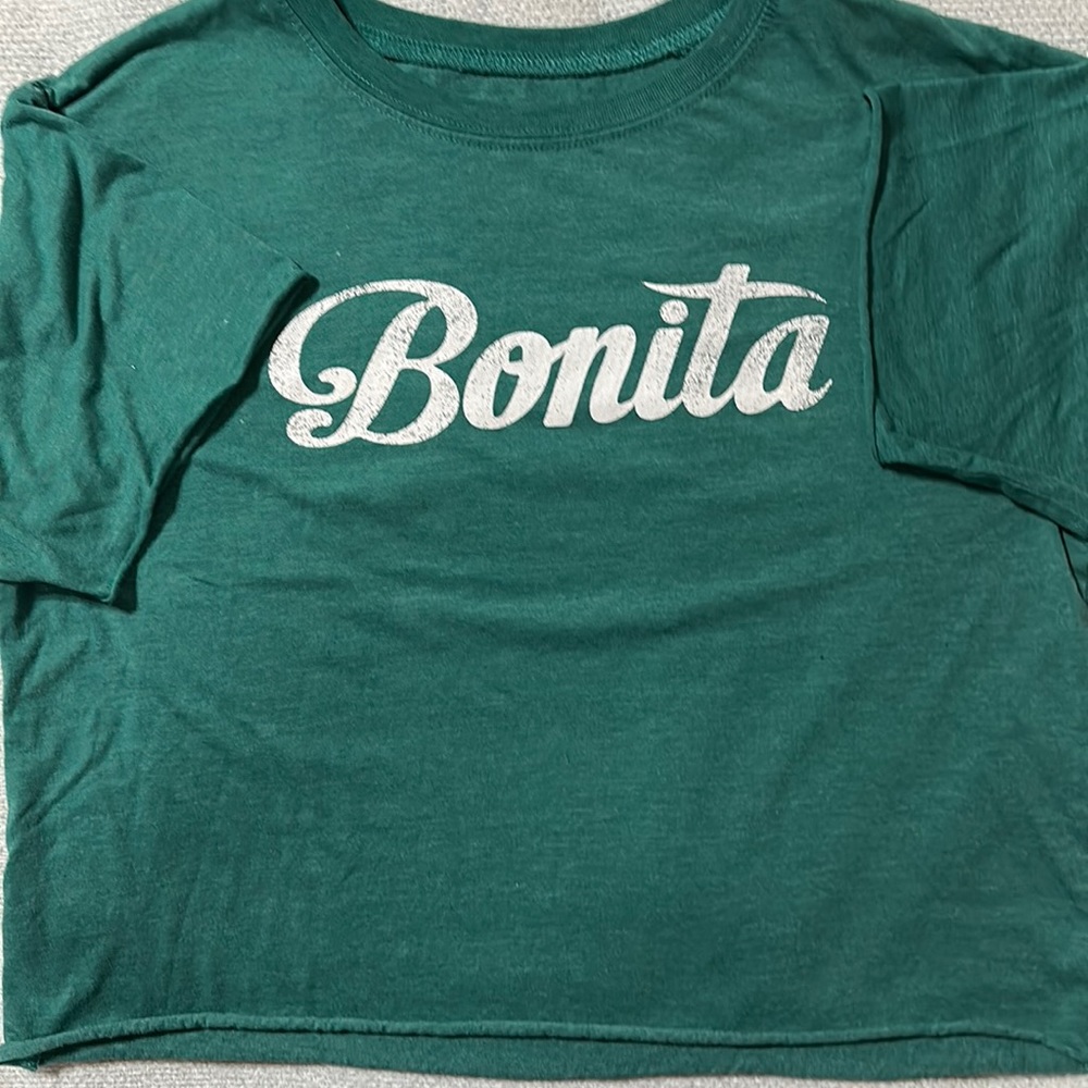 Green “Bonita” long crop top with shirt sleeves.